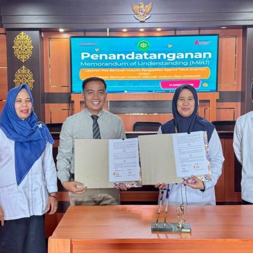 Penandatangan MoU Posbakum Tahun 2026 dengan LBH Marwah Hukum Riau