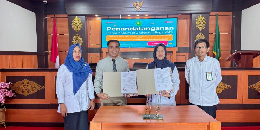 Penandatangan MoU Posbakum Tahun 2026 dengan LBH Marwah Hukum Riau